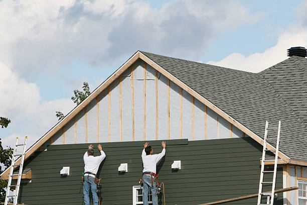 Professional Siding technician working in Lexington, IL